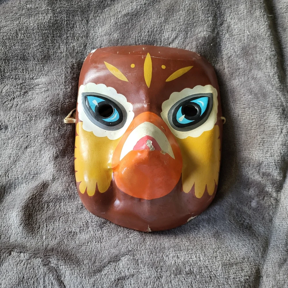 Vintage paper machet mask bird